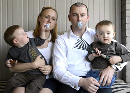 Click to enlarge parents with pacifiers