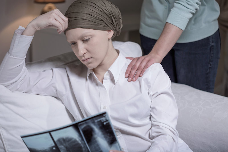 sick woman with friend