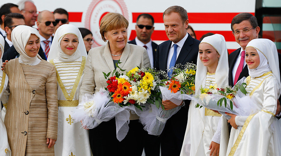 German Chancellor Angela Merkel (C), EU Council President Donald Tusk, Turkish Prime Minister Ahmet Davutoglu (R) and his wife Sare (L)