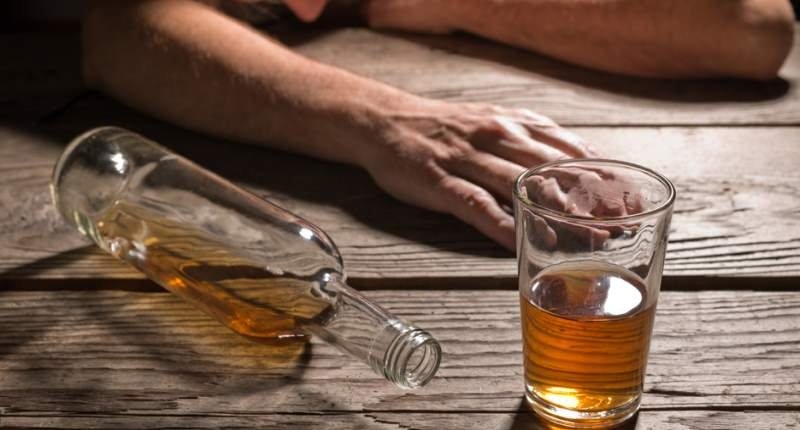 'Drunk man with a glass of brandy' 