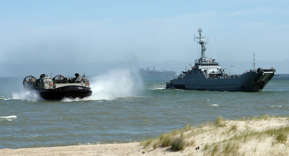 Click to enlarge NATO troops exercises