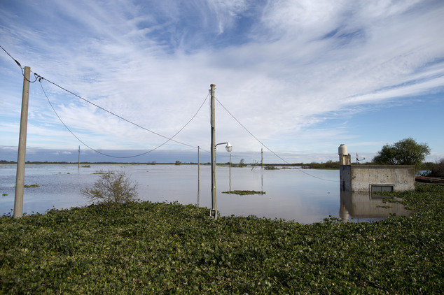 A house is seen flooded at the countryside in Entre Rios, Argentina, Thursday, April 28, 2016. The Argentine Red Cross estimates that around 30,000 people have been affected after rains swelled rivers, swamping fields and towns nationwide 