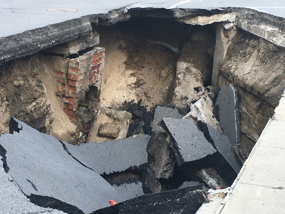 A sinkhole opened up on Canal Street April 29, 2016, near a tunnel running underneath Harrah's Casino