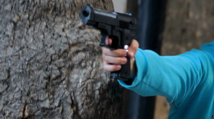 Child with handgun
