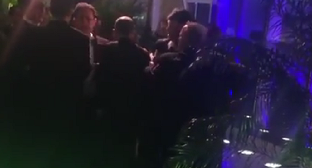 Click to enlarge News reporters fight