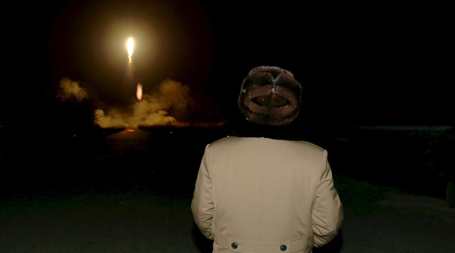 Click to enlarge North Korean leader Kim Jong Un watches the ballistic rocket launch