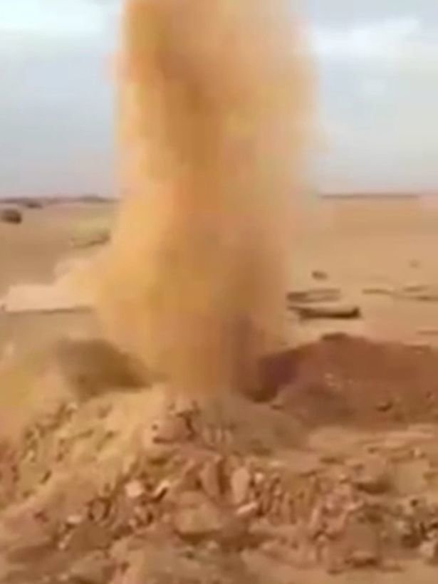 The hole fired sand hundreds of feet into the air 