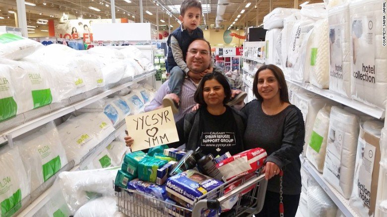 Click to enlarge syrian refugees help wildfire victims