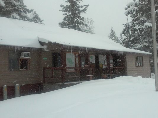 Heavy snow fell in the Little Belt Mountains Tuesday with about a foot falling at the Belt Creek Ranger District office in the Helena-Lewis and Clark National Forest.