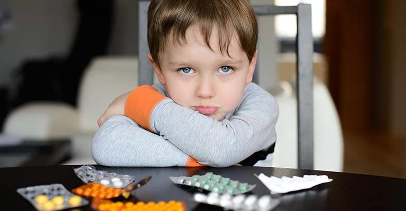 boy with medications