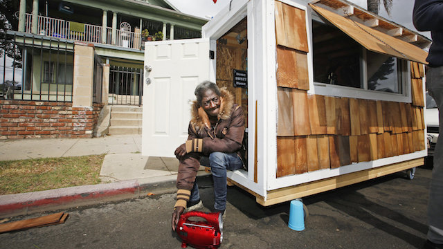 woman in tiny house