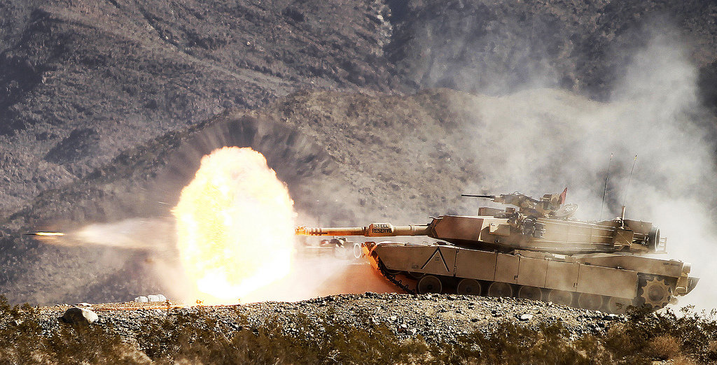 Tank firing shell