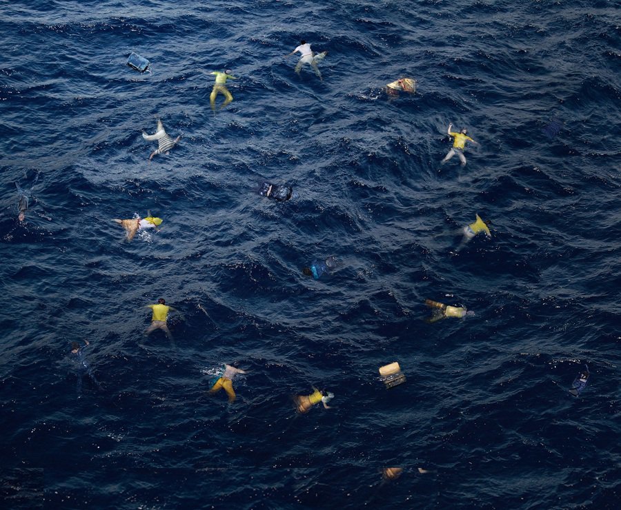 Click to enlarge Picture of EU flag as drowning refugees