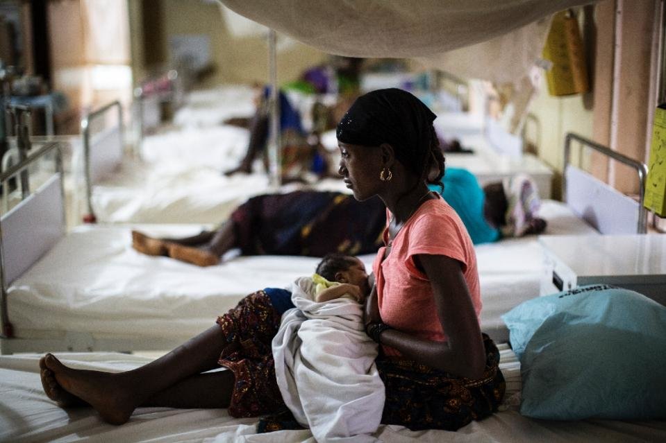 Nursing mother at West Africa hospital