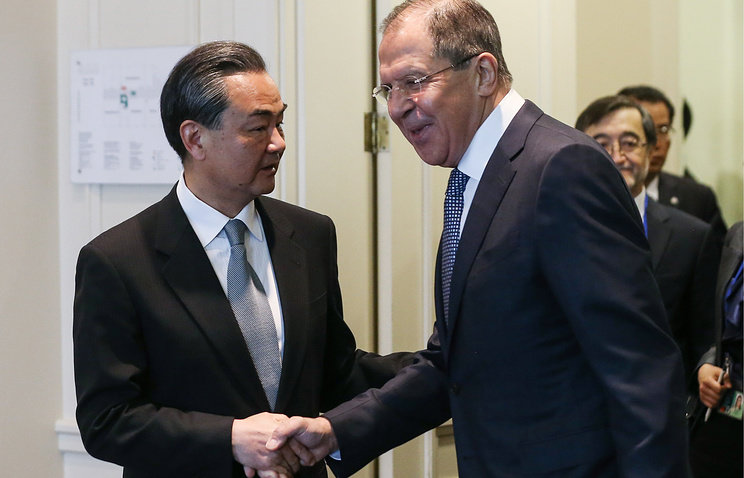 Click to enlarge Chinese Foreign Minister Wang Yi and Russian Foreign Minister Sergey Lavrov