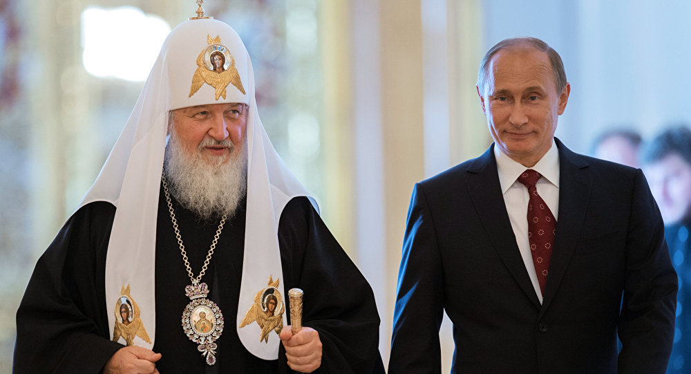 Russian President Vladimir Putin and Patriarch Kirilll