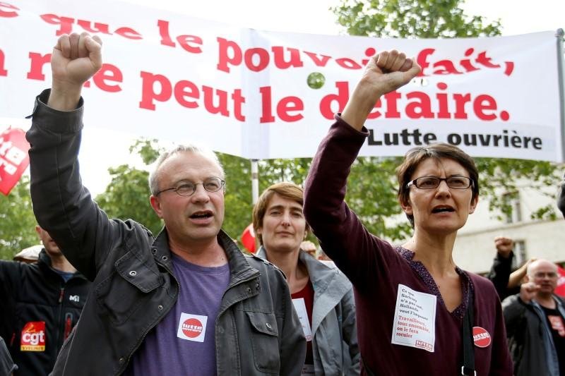 Click to enlarge Jean-Pierre Mercier, CGT union representative (L) and Nathalie Arthaud (R)