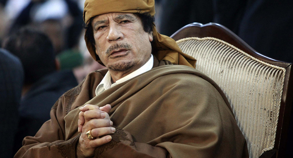 Click to enlarge Muammar Gaddafi