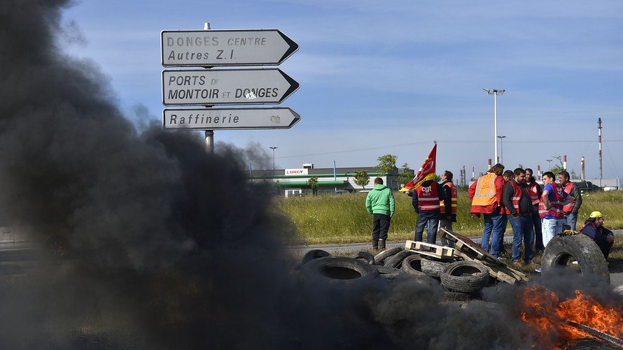 Click to enlarge Striking workers at Total oil refinery in Donges, France