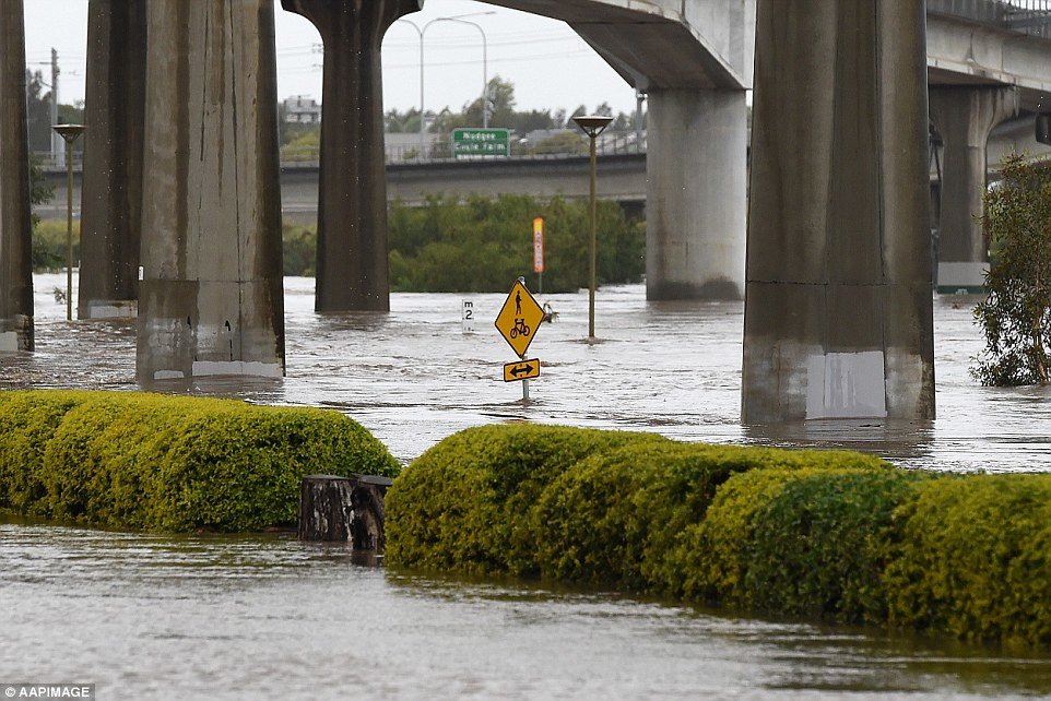 Click to enlarge A flooded car park at the Toombul shopping centre in Brisbane on Saturday. Hundreds of State Emergency Service crews are working to deal with the damage caused by wet and windy weather