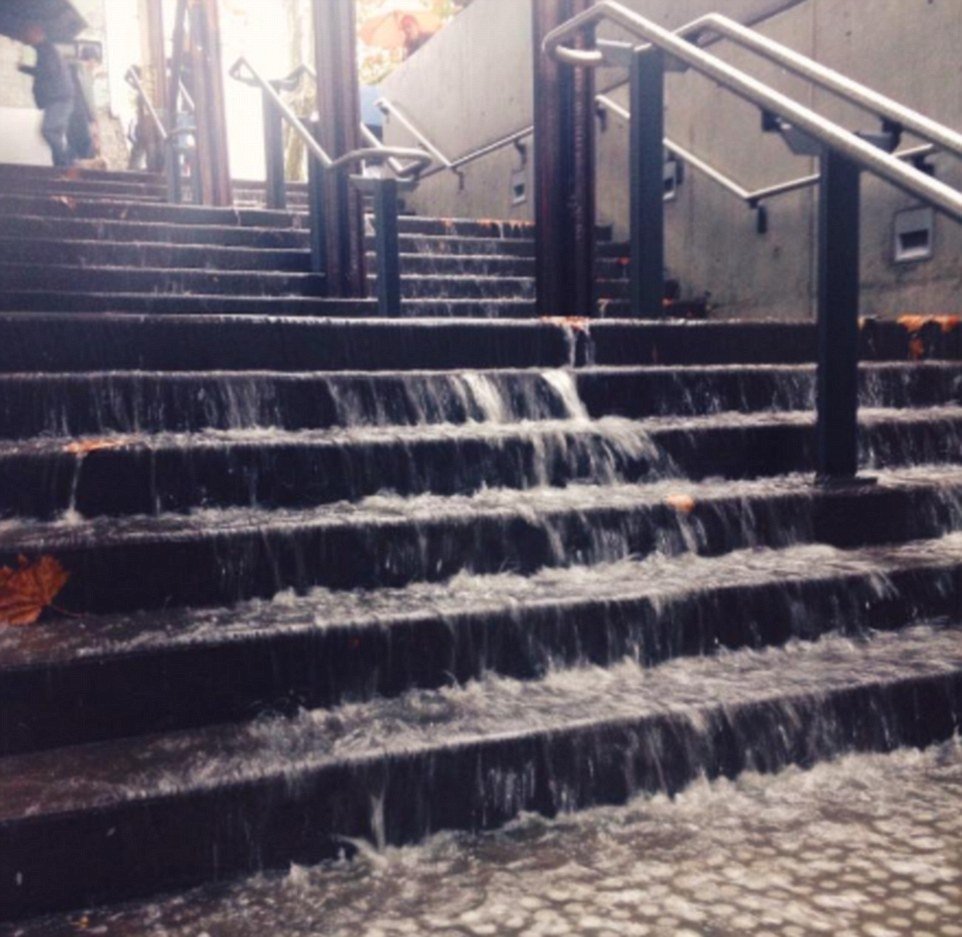 Click to enlarge The stairs for multi-arts centre Carriageworks located in Sydney turned into a waterfall from the downpour