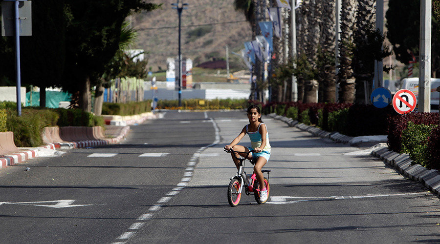 girl riding bike