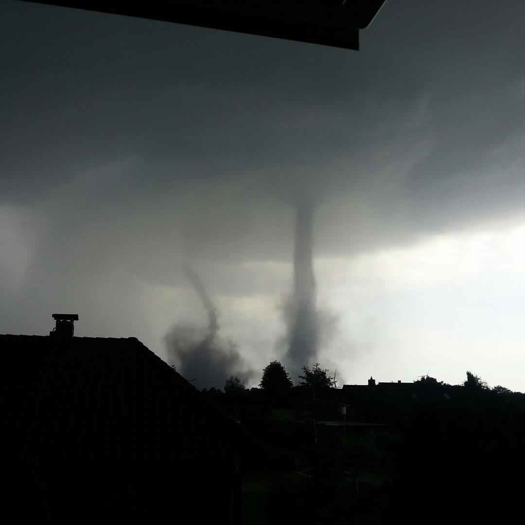 Click to enlarge rare twin tornadoes hit Germany
