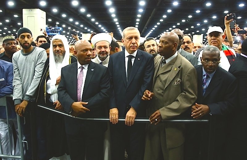 Click to enlarge Erdogan at funeral