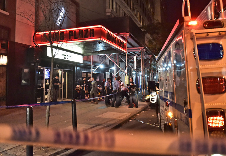 Police officers and paramedics at Irving Plaza