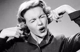 plugging ears