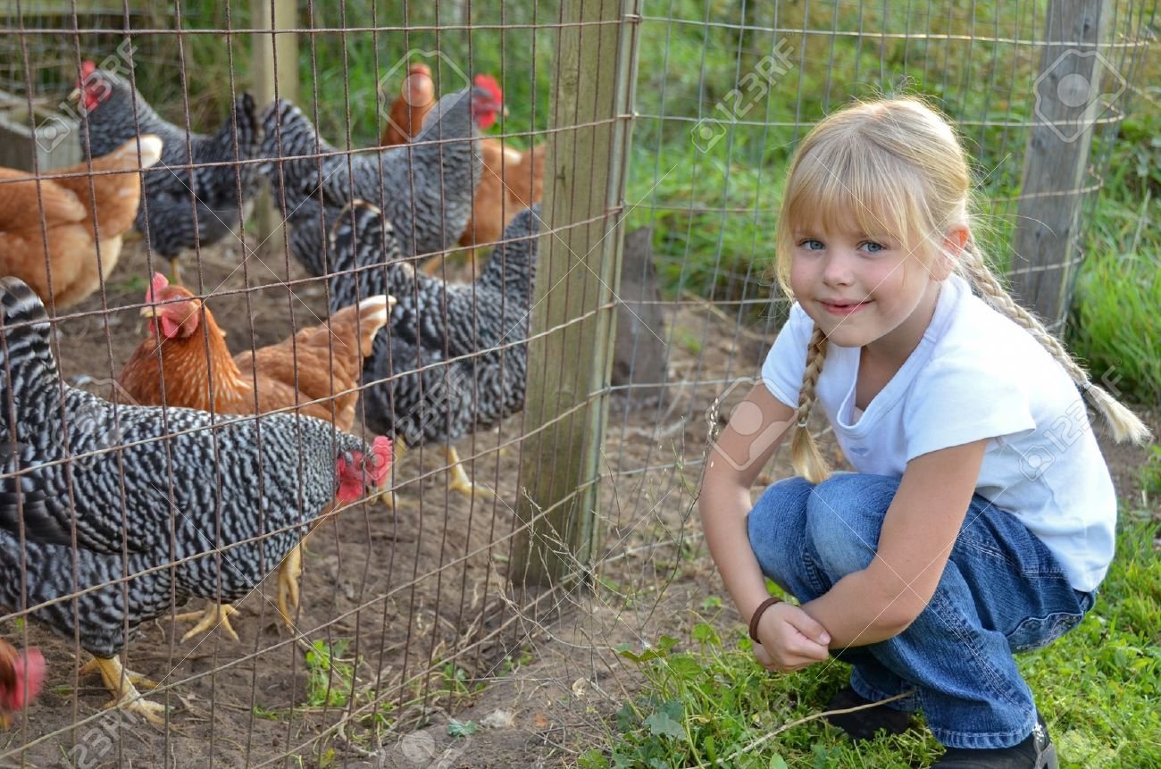 Click to enlarge girl with chickens
