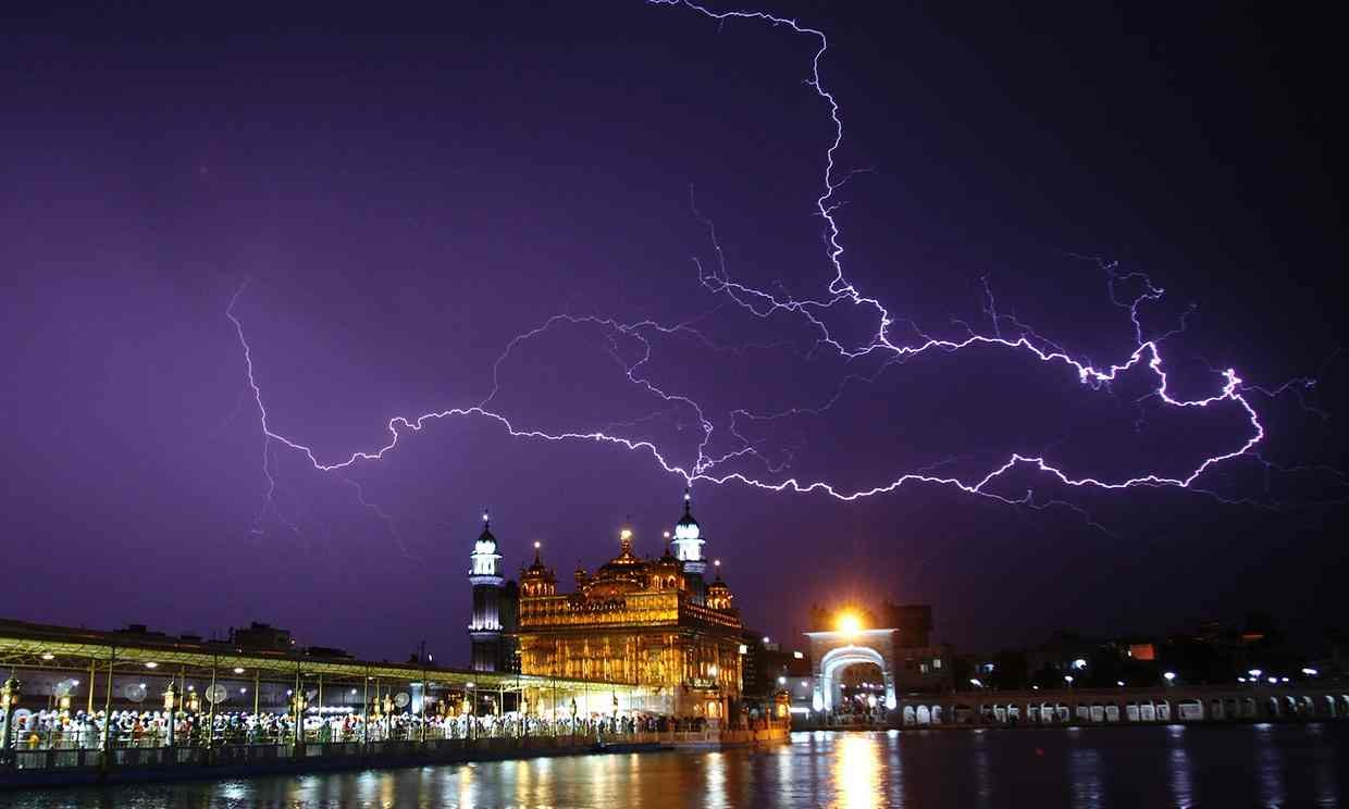 Lightning over the golden temple in Amritsar during storms in April. 