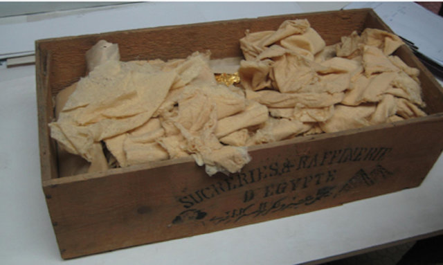 Box with golden sheets