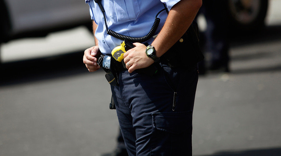 officer with taser