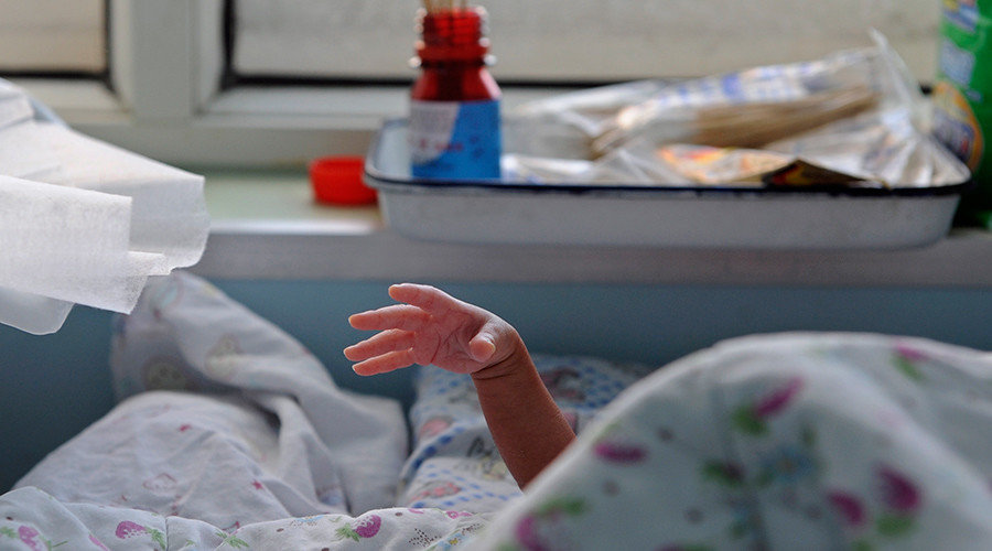 Click to enlarge baby in hospital