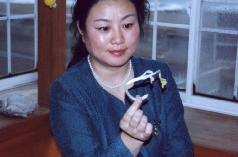 woman growing a plant