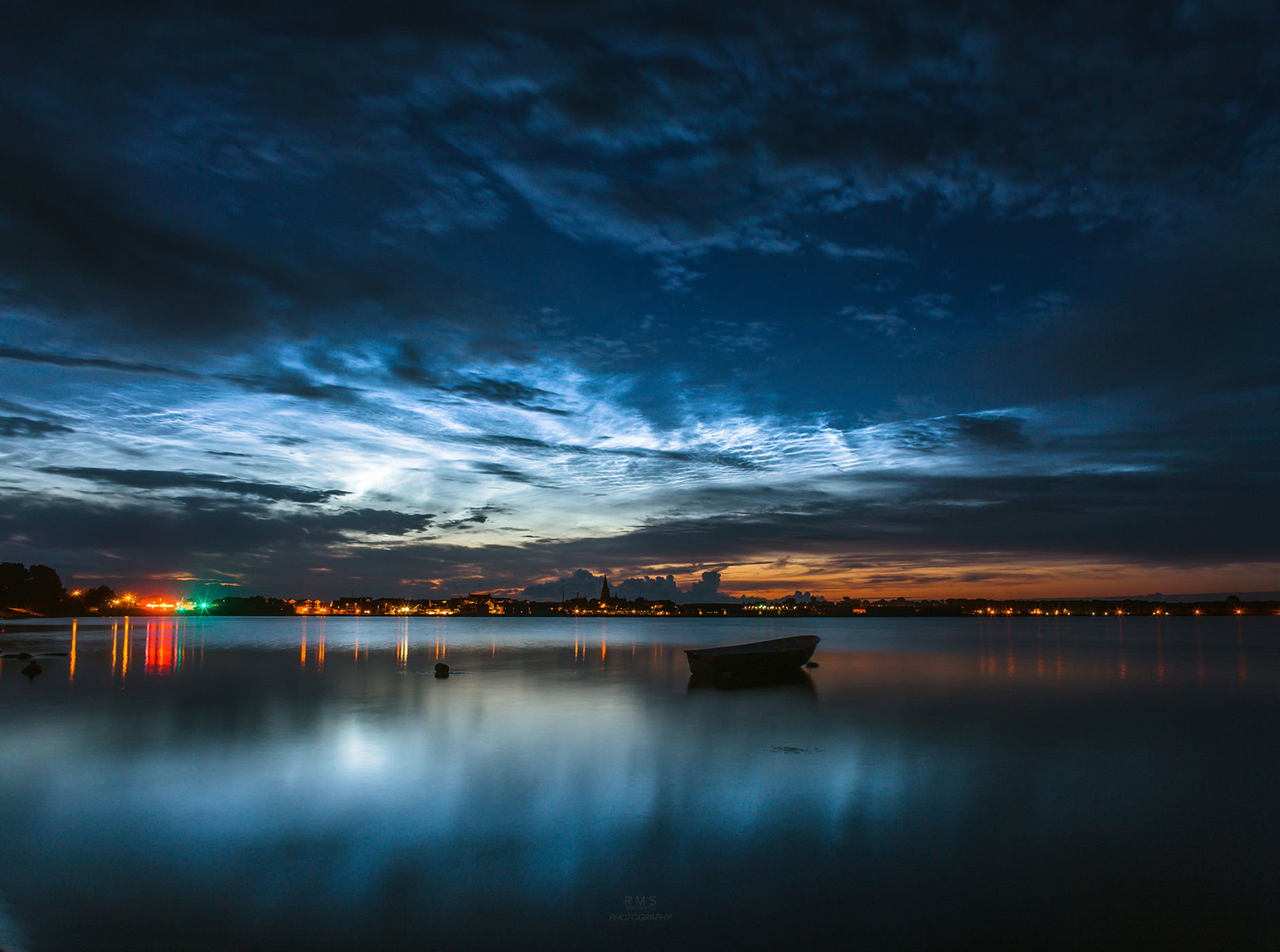 Click to enlarge noctilucent clouds