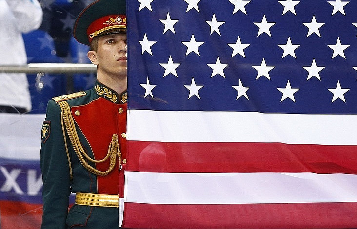 Russian soldier near American flag