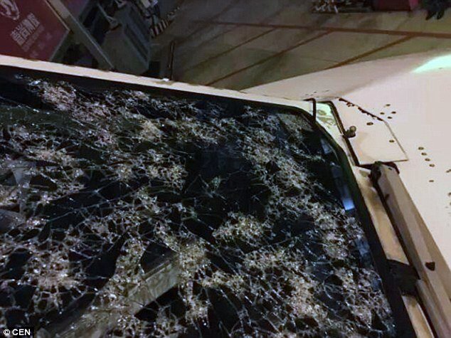 A close up shot of the windshield shows the extent of the damage, where the glass was completely cracked but managed to hold its shape