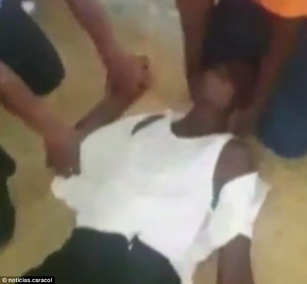 Click to enlarge The girls aged between 12 and 15 were filmed screaming and writhing on the floor in some chilling footage
