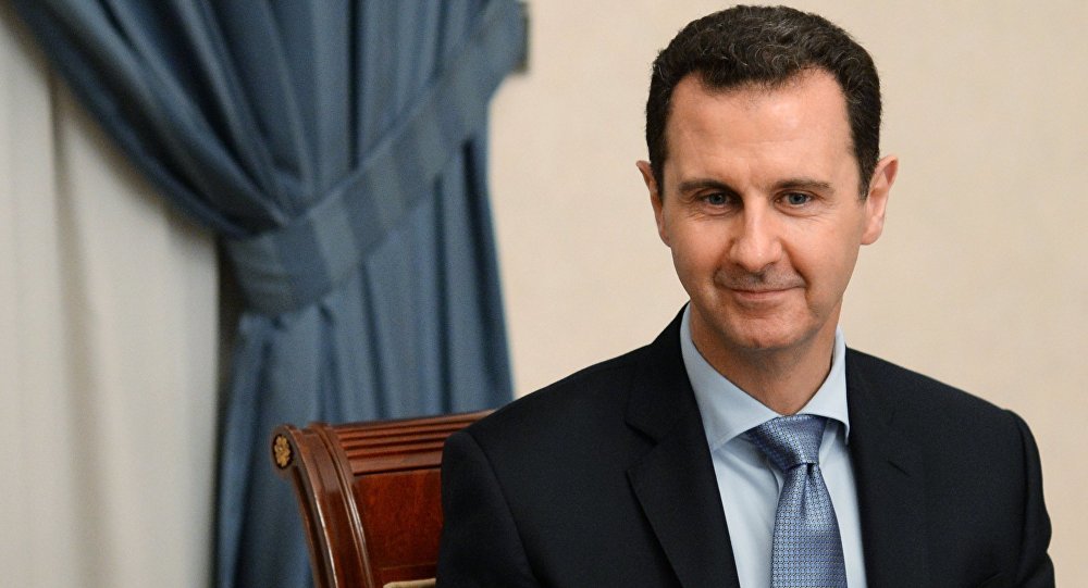 Click to enlarge assad smile