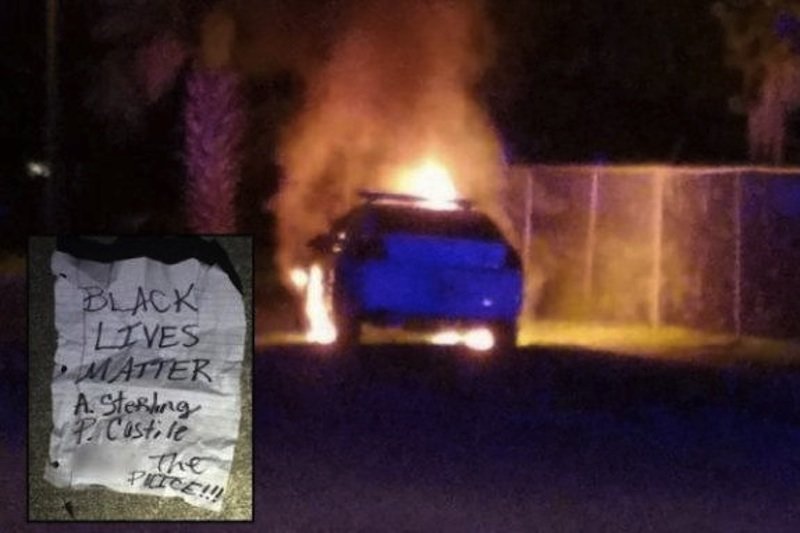 police car firebombed