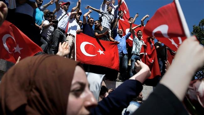 Click to enlarge Turkish national flags during a pro-government demonstration