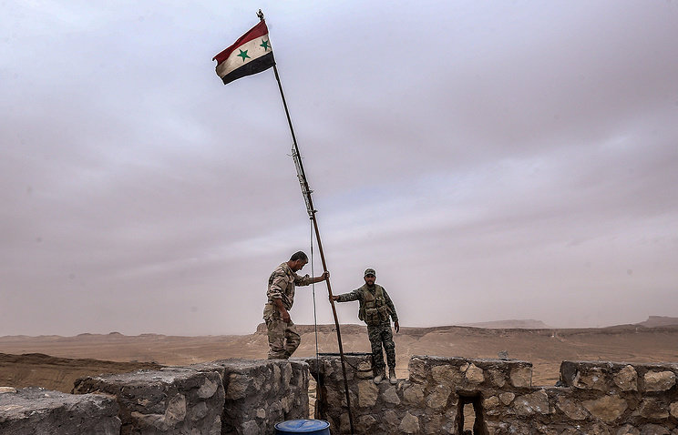 Soldiers raising Turkish flag
