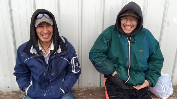 Lee-Michael Shawn Ruben and John Sam Green enjoy the snow in Paulatuk.