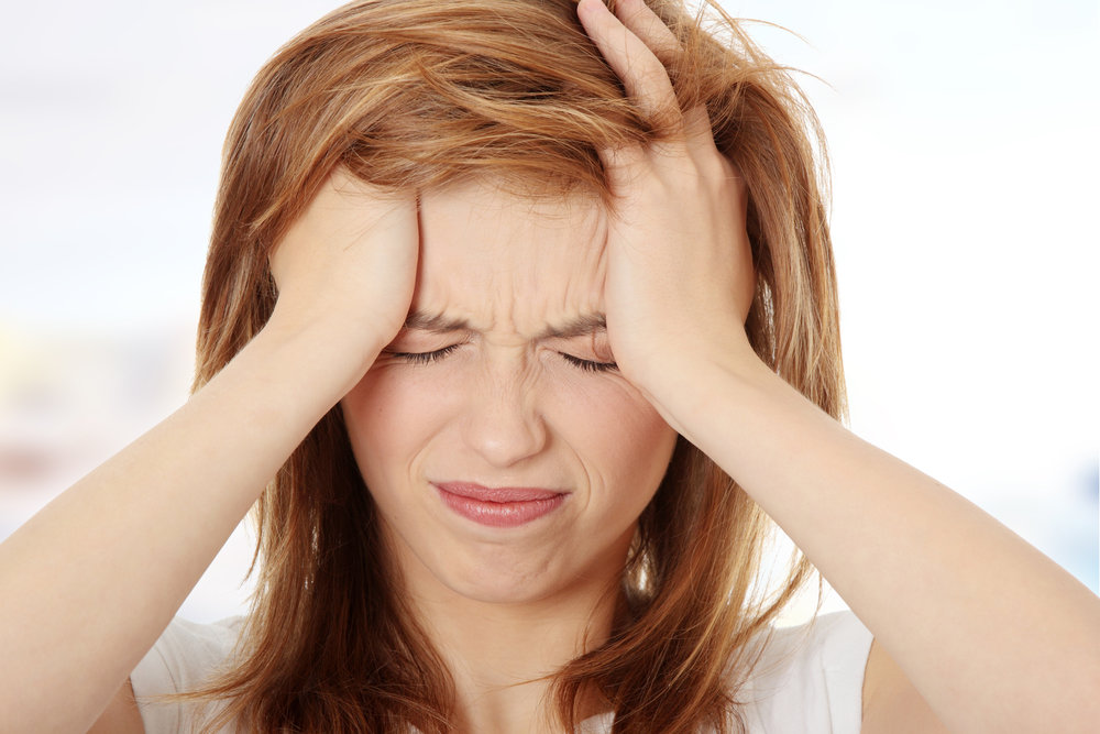 Click to enlarge woman with headache