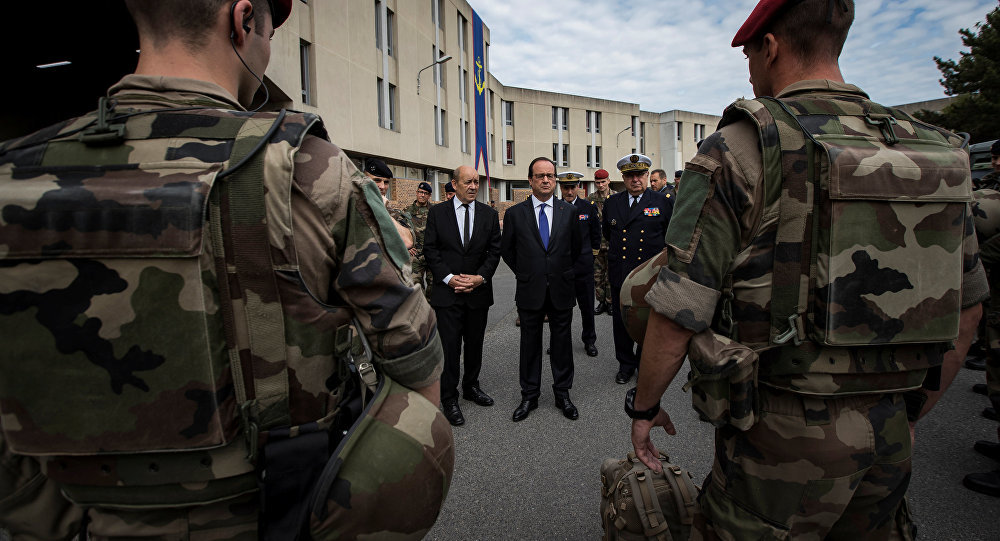 Hollande and Jean-Yves Le Drian