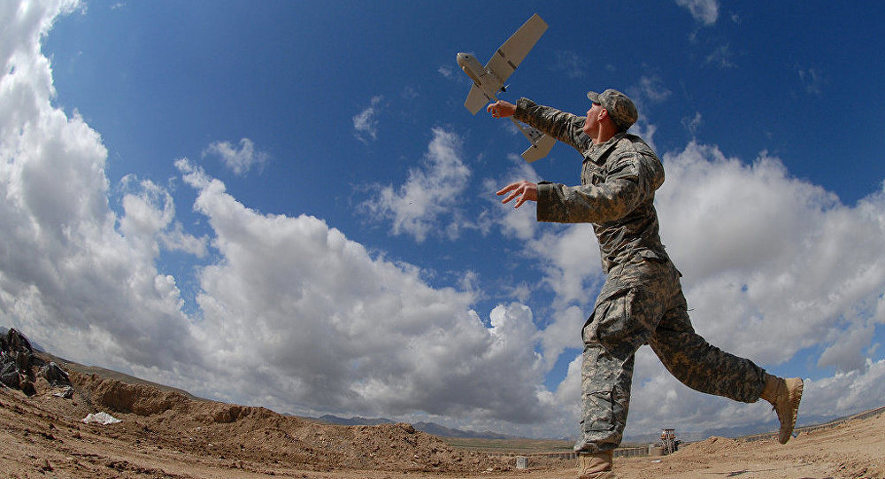 Soldier launching drone