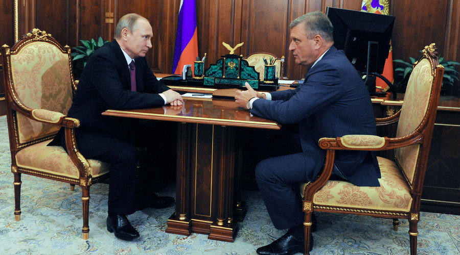 Russian President Vladimir Putin, left, and Head of the Federal Service for State Registration, Cadastre and Cartography Igor Vasilyev