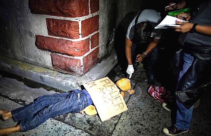 Click to enlarge dead drug pusher